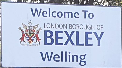 Street Sign Welcome to Welling